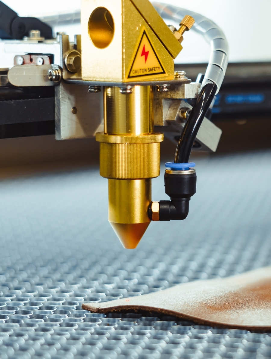 Textiles – "Laser cutting head processing fabric in the textile industry"