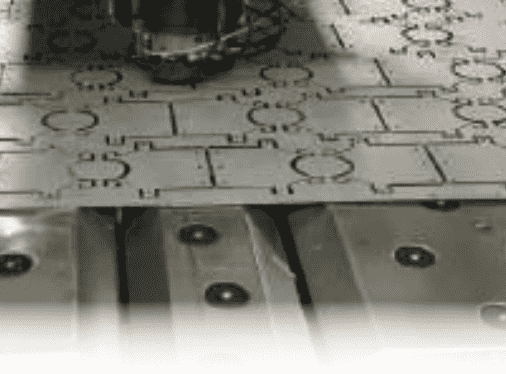CNC punching machine with automated tool change.