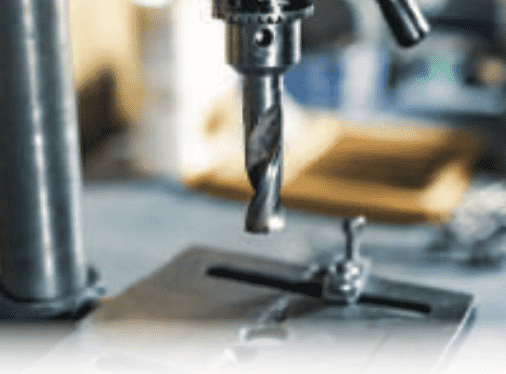 Industrial CNC drilling interface for metal fabrication.