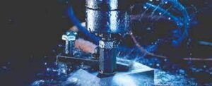 High-speed electrochemical milling process with fluid spray and precision tool cutting metal under controlled automation